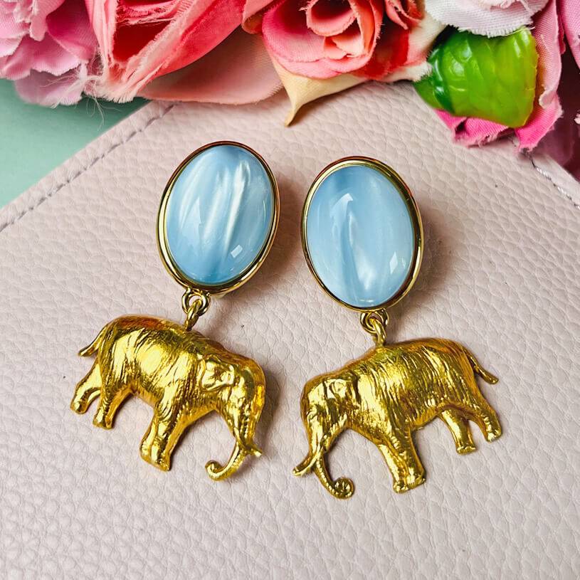 SchwesterSchwester Ohrstecker in Hellblau mit vergoldetem Elefant Räumungsverkauf